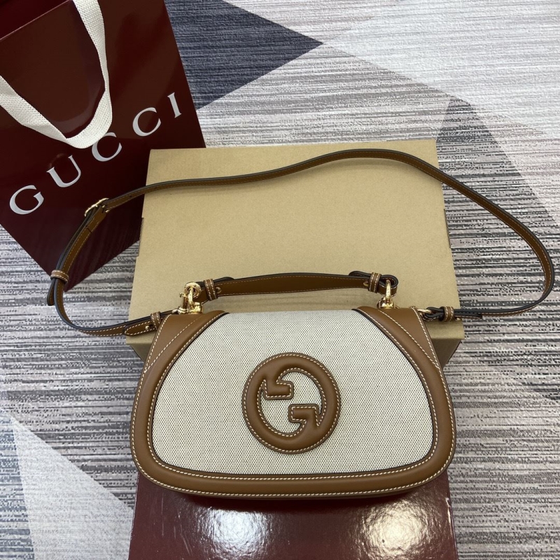 G*u*i top handle bags